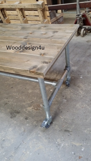 Scaffold tube table with wheels