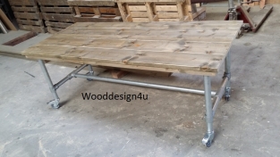 Scaffold tube table with wheels