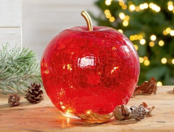 Witte glazen appel met ledverlichting.